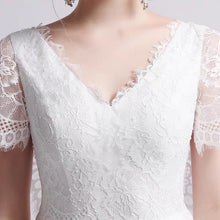 將圖片載入圖庫檢視器，The Petunia Wedding Bridal Illusion Short Draped Sleeves Lace Gown - WeddingConfetti