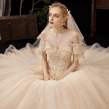 將圖片載入圖庫檢視器，The Serenity Wedding Bridal Off Shoulder Glitter Champagne Gown - WeddingConfetti